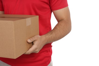 Photo of Courier holding cardboard box on white background, closeup