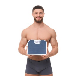 Portrait of happy athletic man with scales on white background. Weight loss concept