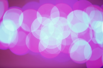 Beautiful glowing lights as background. Bokeh effect