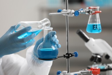 Photo of Scientist working with samples in laboratory, closeup