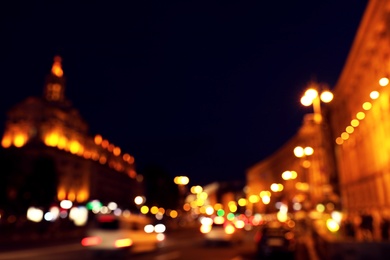 Photo of Blurred view of beautiful city at night. Bokeh effect