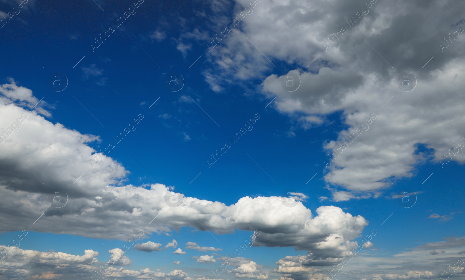 Photo of Picturesque view on beautiful cloudy sky and green field