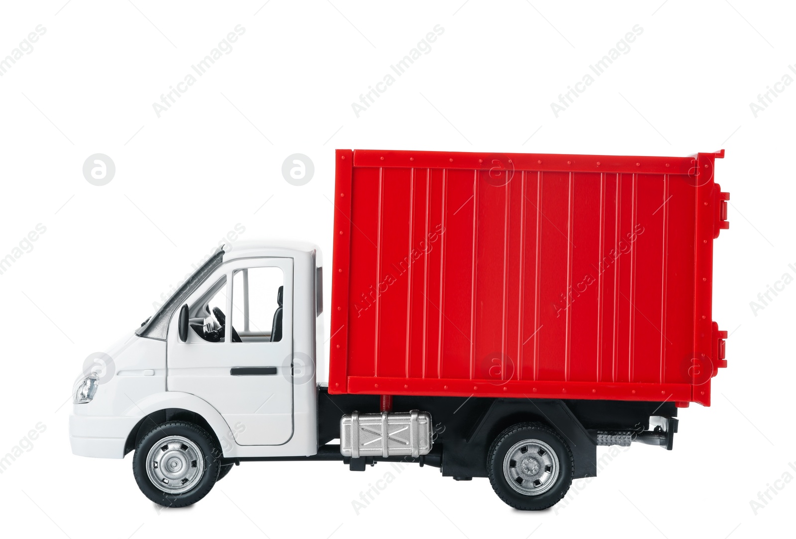 Photo of Toy truck isolated on white. Logistics and wholesale concept