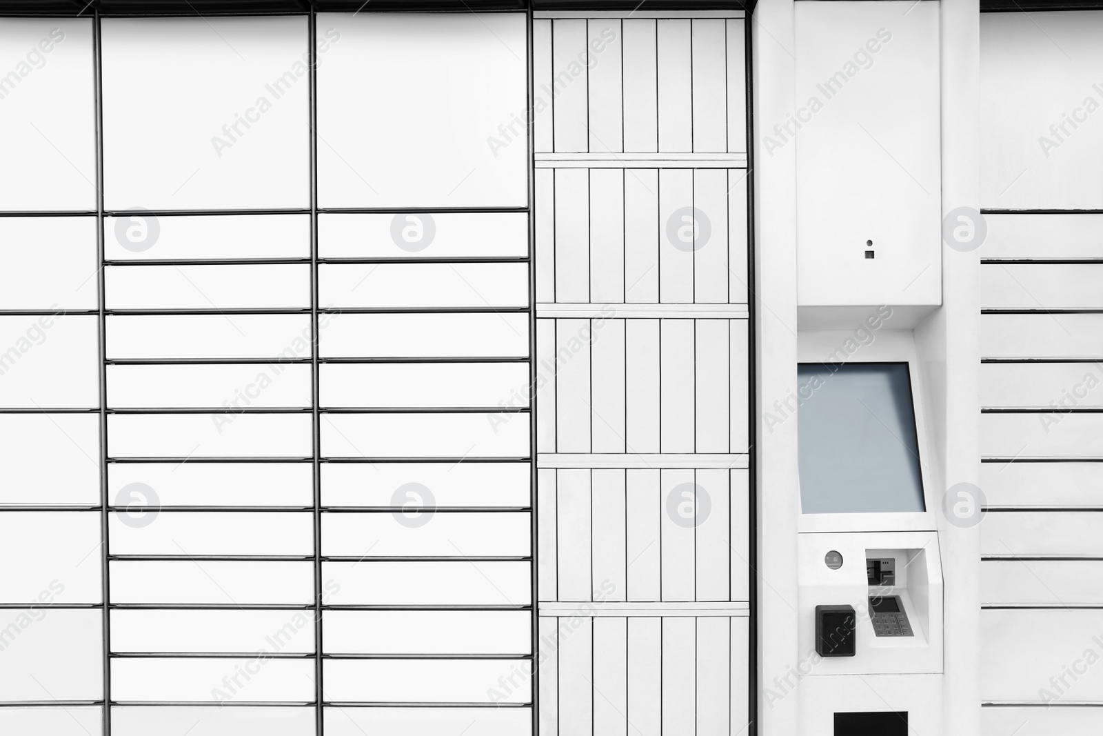Photo of Modern parcel locker with many postal boxes as background