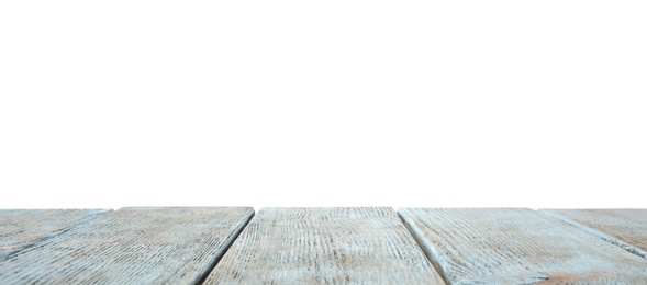 Empty wooden table surface on white background. Mockup for design