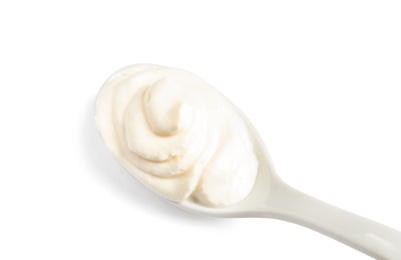 Photo of Serving spoon with sour cream on white background, top view