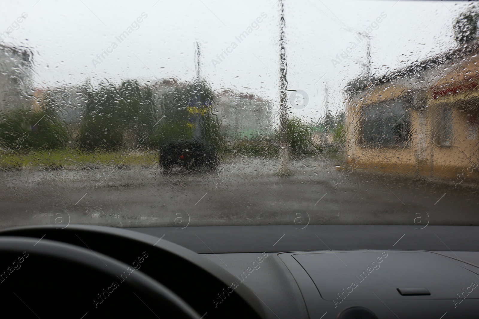 Photo of Rain drops on windshield, view from inside