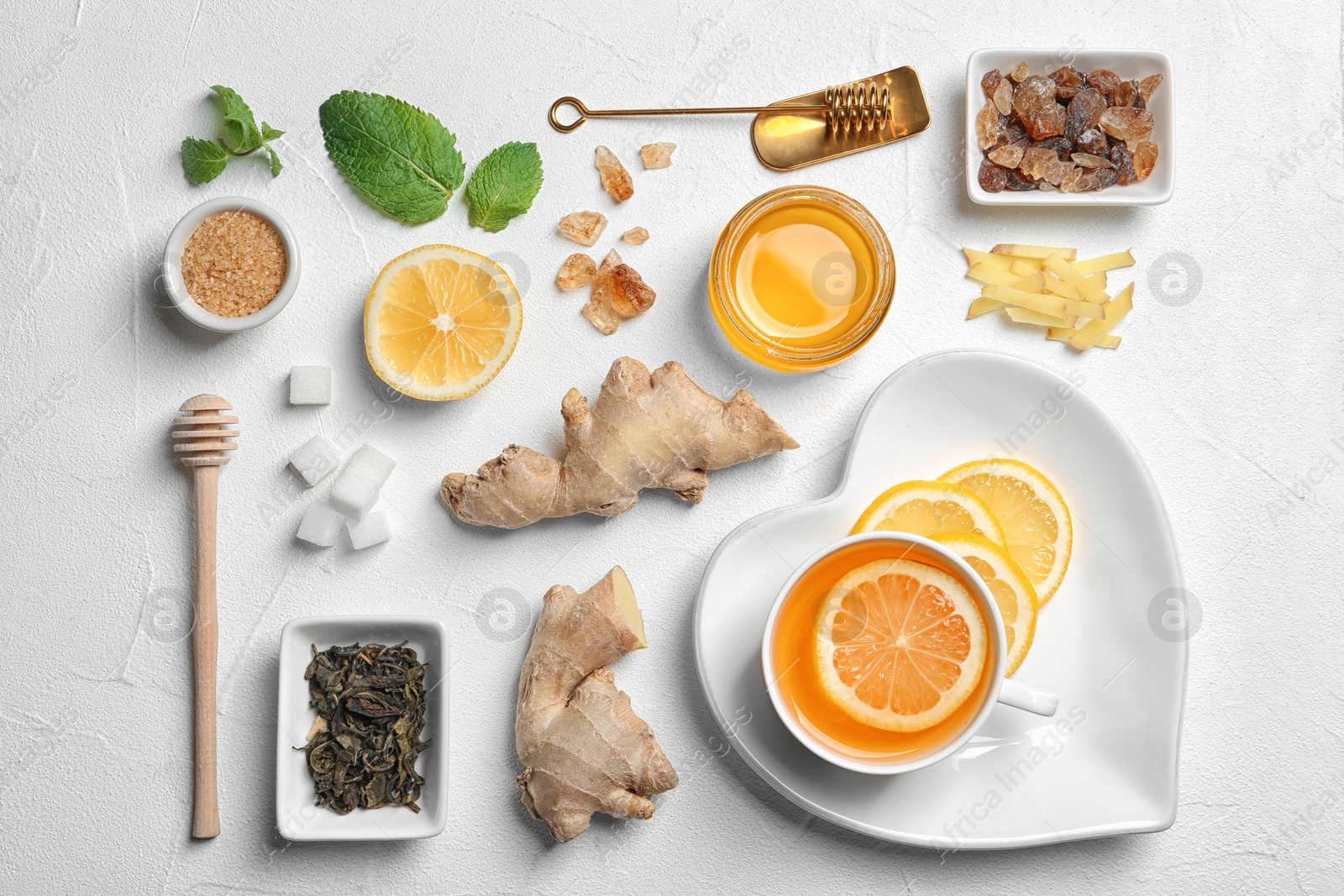 Photo of Flat lay composition with tea and therapeutic products on white background