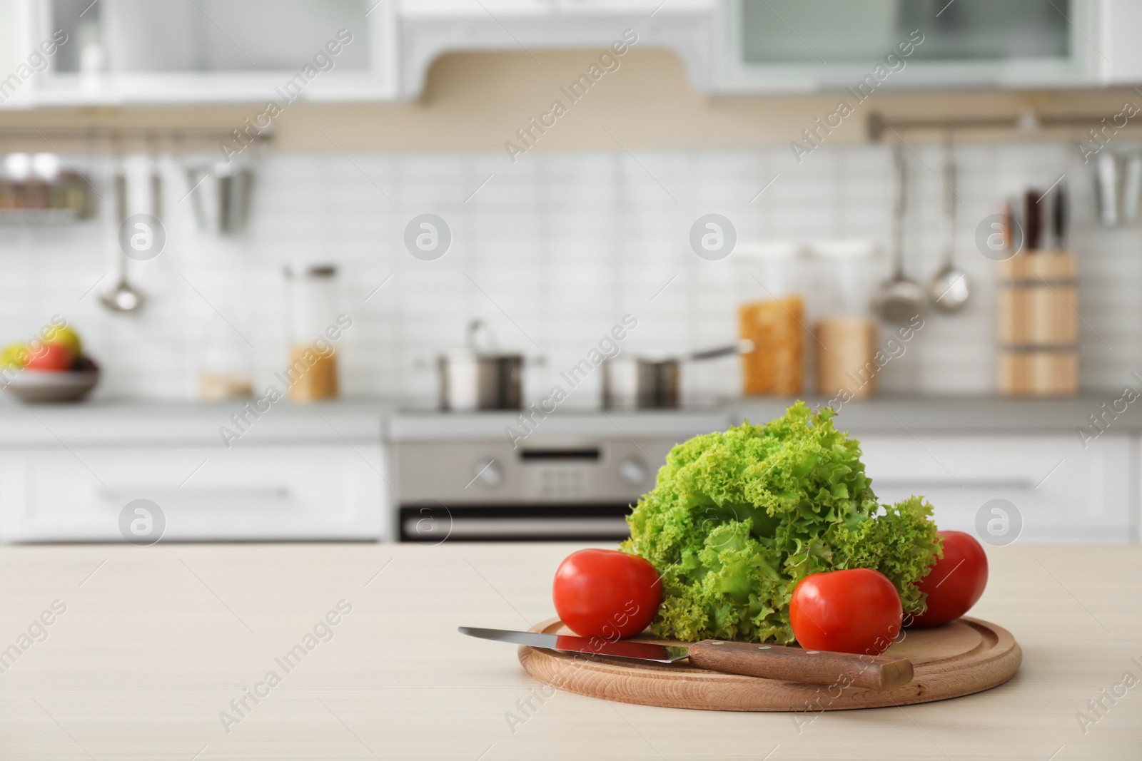 Photo of Products and blurred view of kitchen interior on background