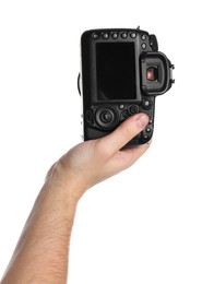 Photographer holding modern camera on white background, closeup