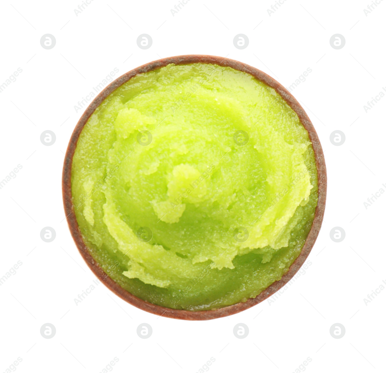 Photo of Bowl of green body scrub isolated on white, top view