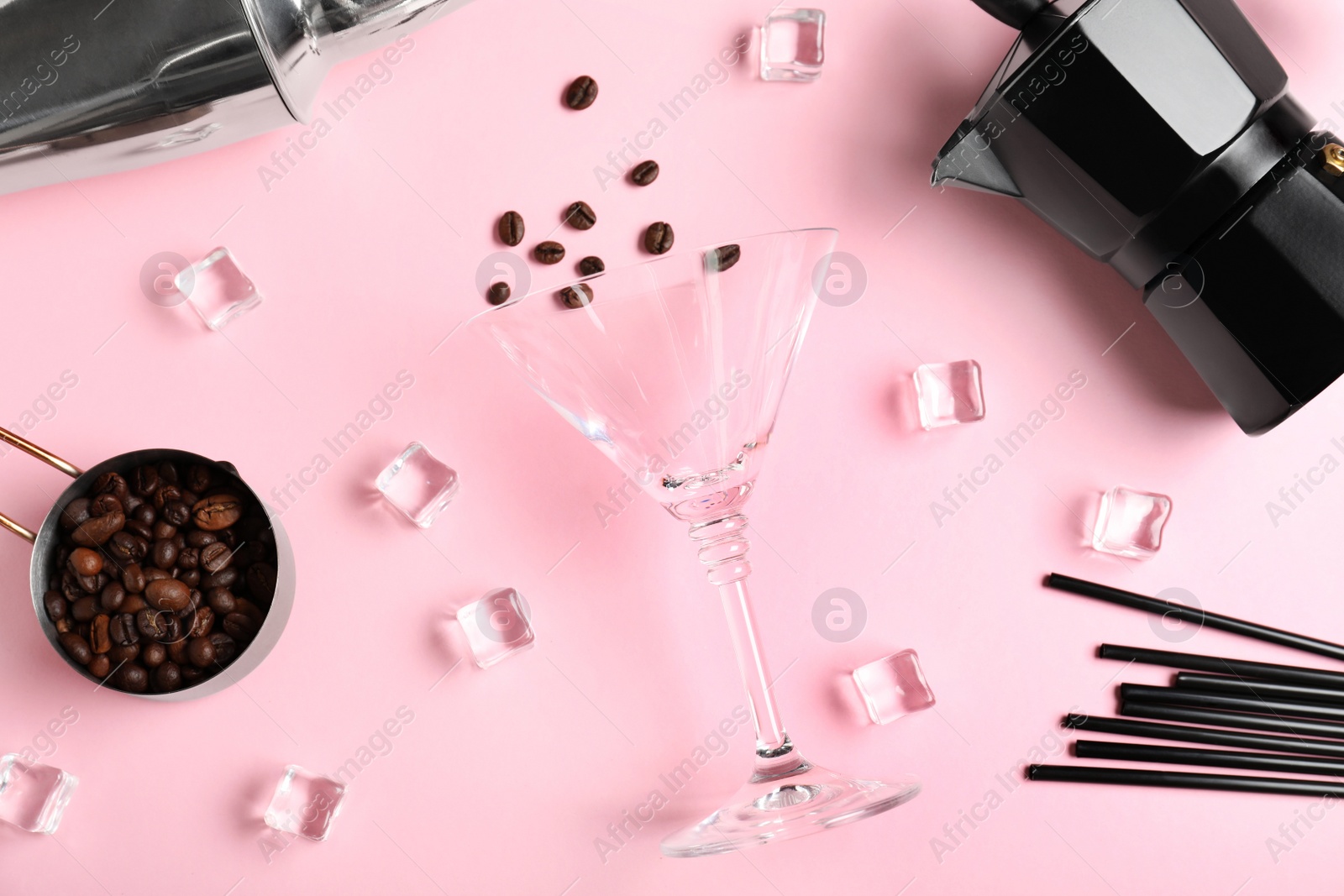 Photo of Flat lay composition with coffee beans, ice cubes and bar equipment on color background. Alcohol cocktail recipe - Espresso Martini