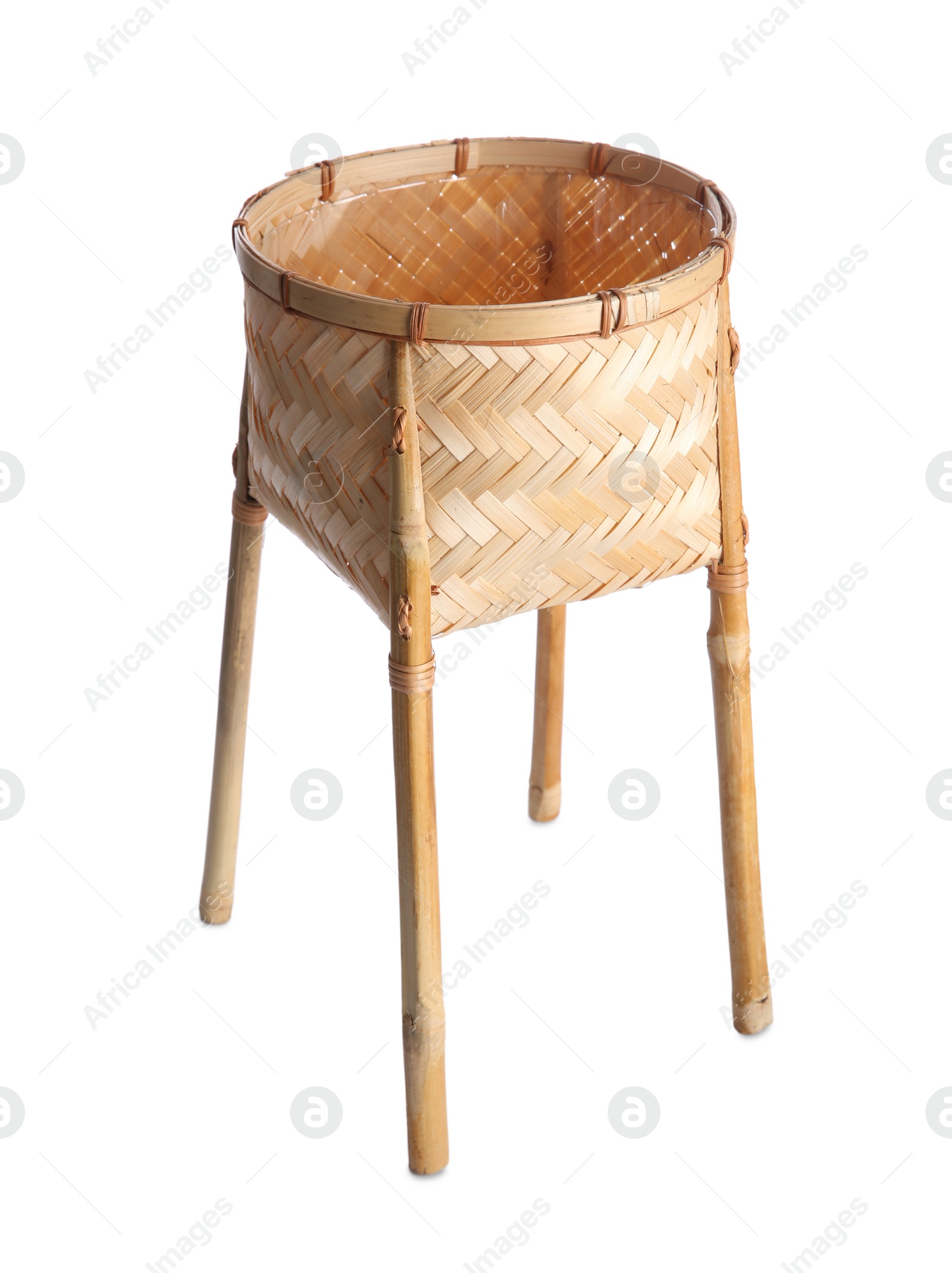 Photo of Empty wicker plant stand isolated on white. Interior accessory