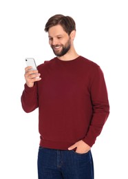 Photo of Man in casual clothes with smartphone on white background