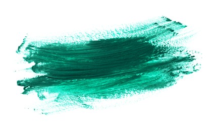 Photo of Dark green oil paint stroke on white background, top view