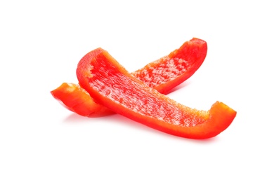 Photo of Slices of ripe red bell pepper on white background