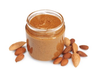 Tasty nut paste in jar and almonds isolated on white