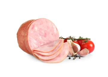 Tasty ham with cherry tomatoes, garlic and pepper isolated on white