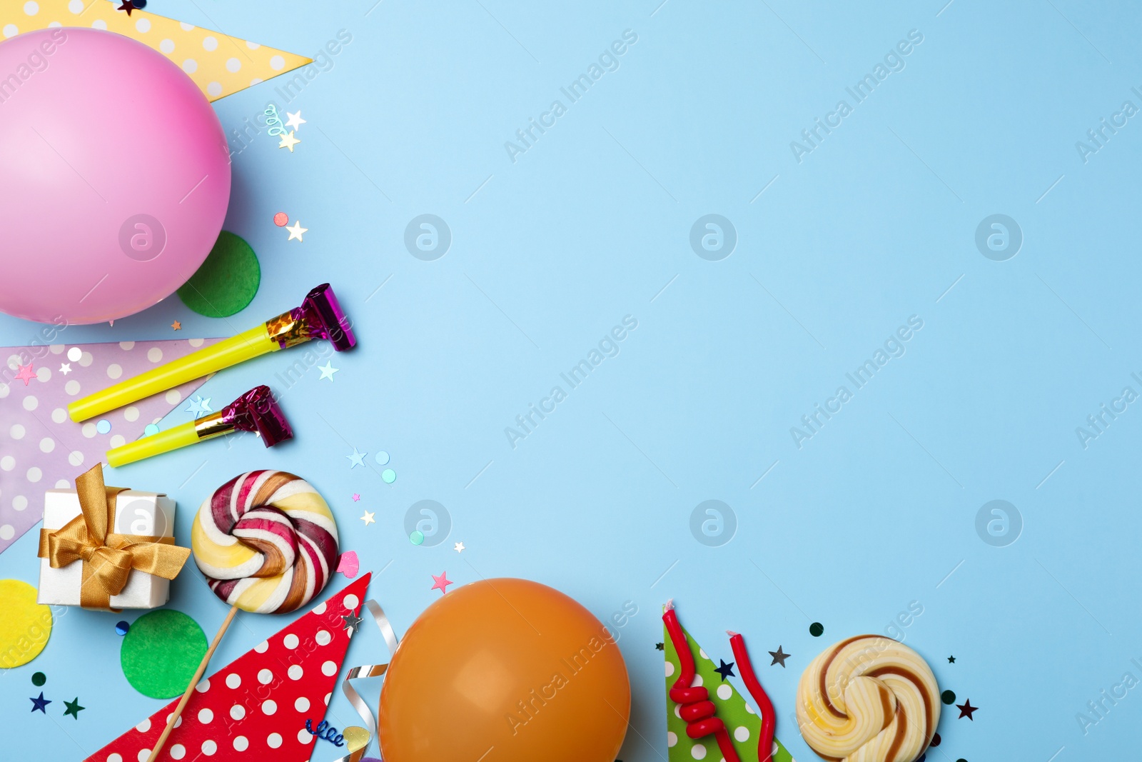 Photo of Flat lay composition with birthday party items on color background