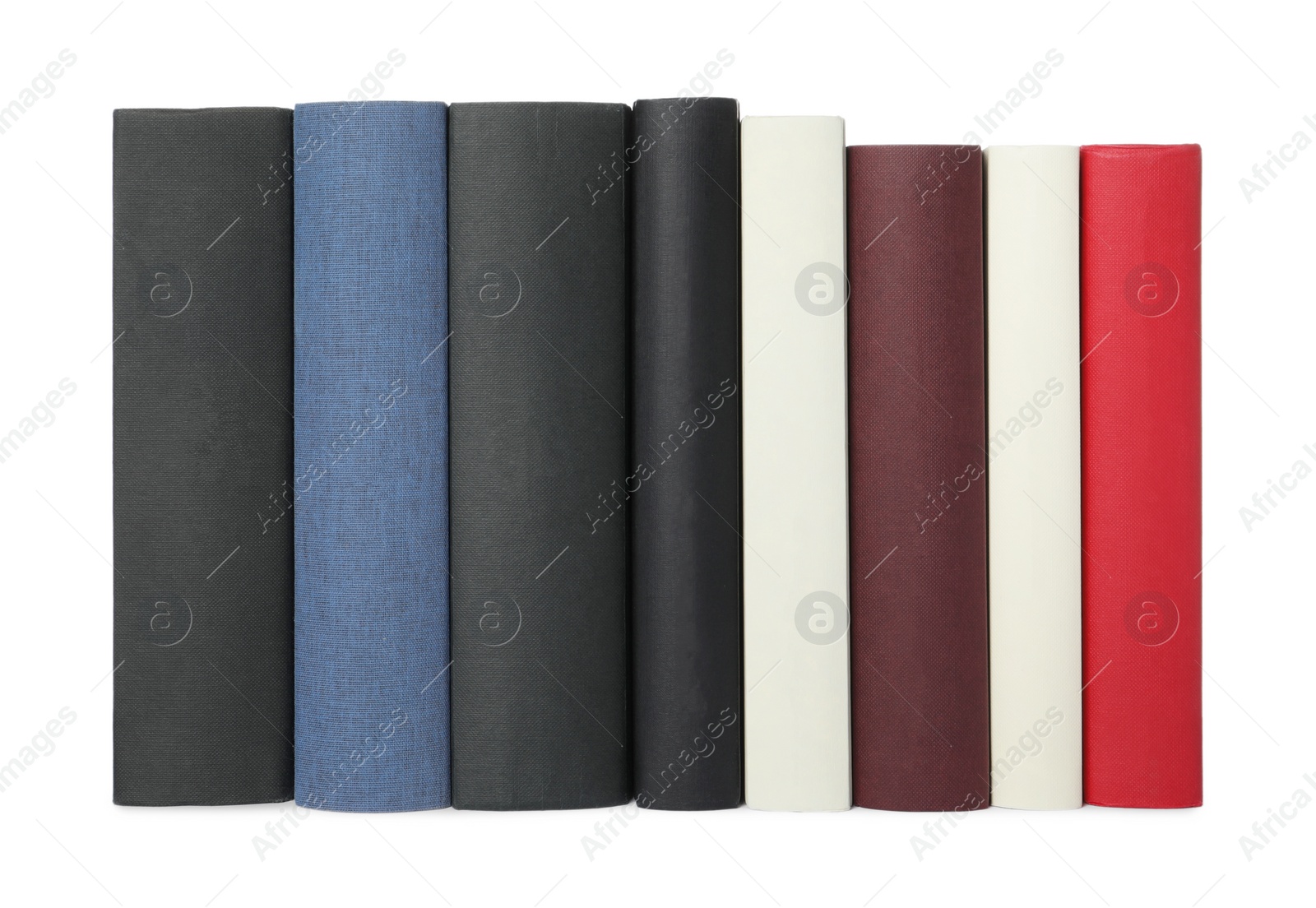 Photo of Row of hardcover books isolated on white