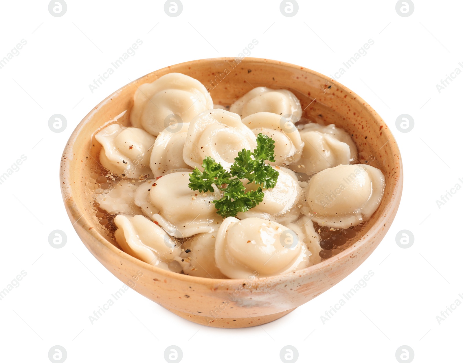 Photo of Bowl of tasty dumplings in broth isolated on white