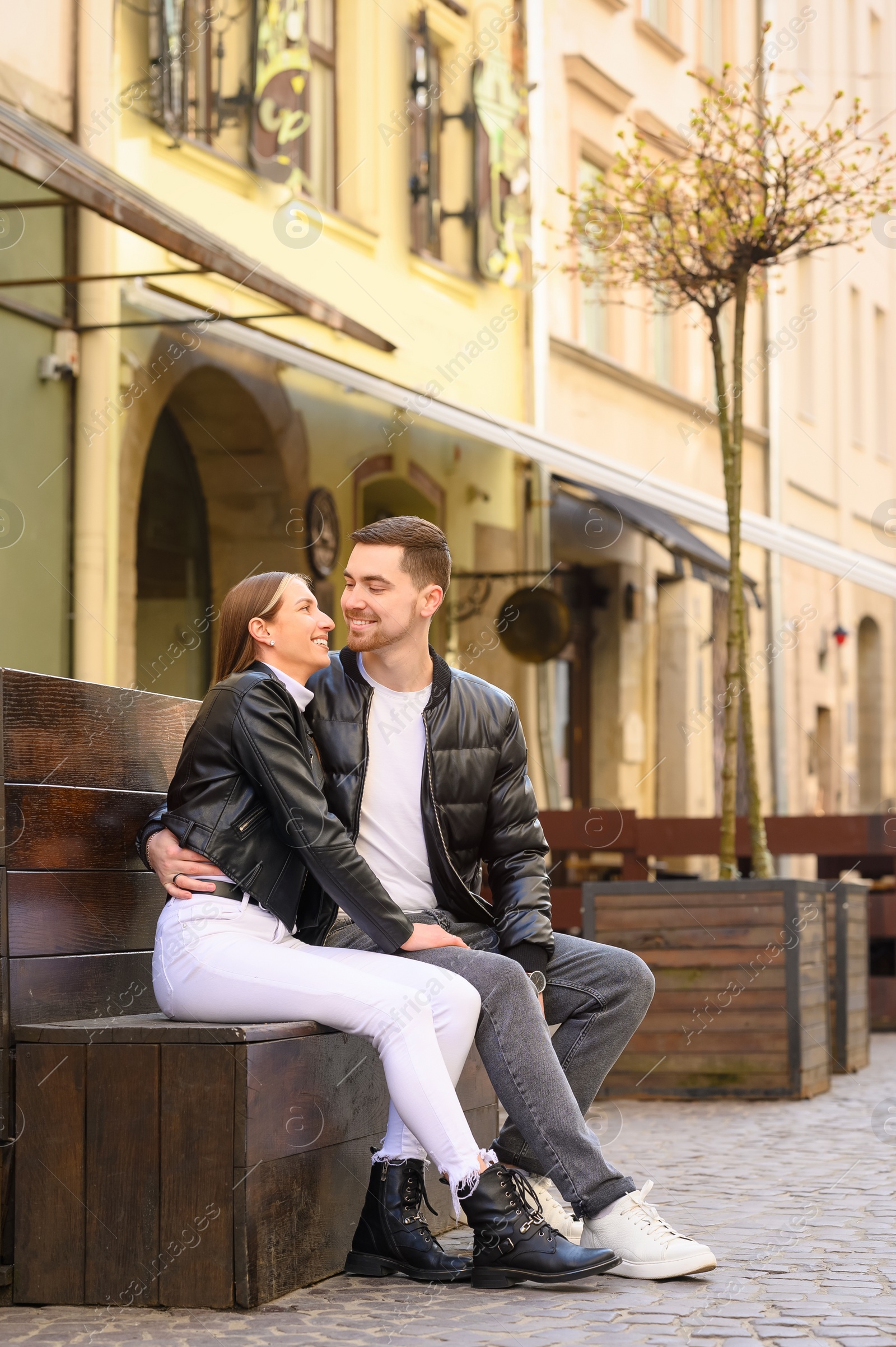 Photo of Lovely young couple enjoying time together outdoors. Romantic date