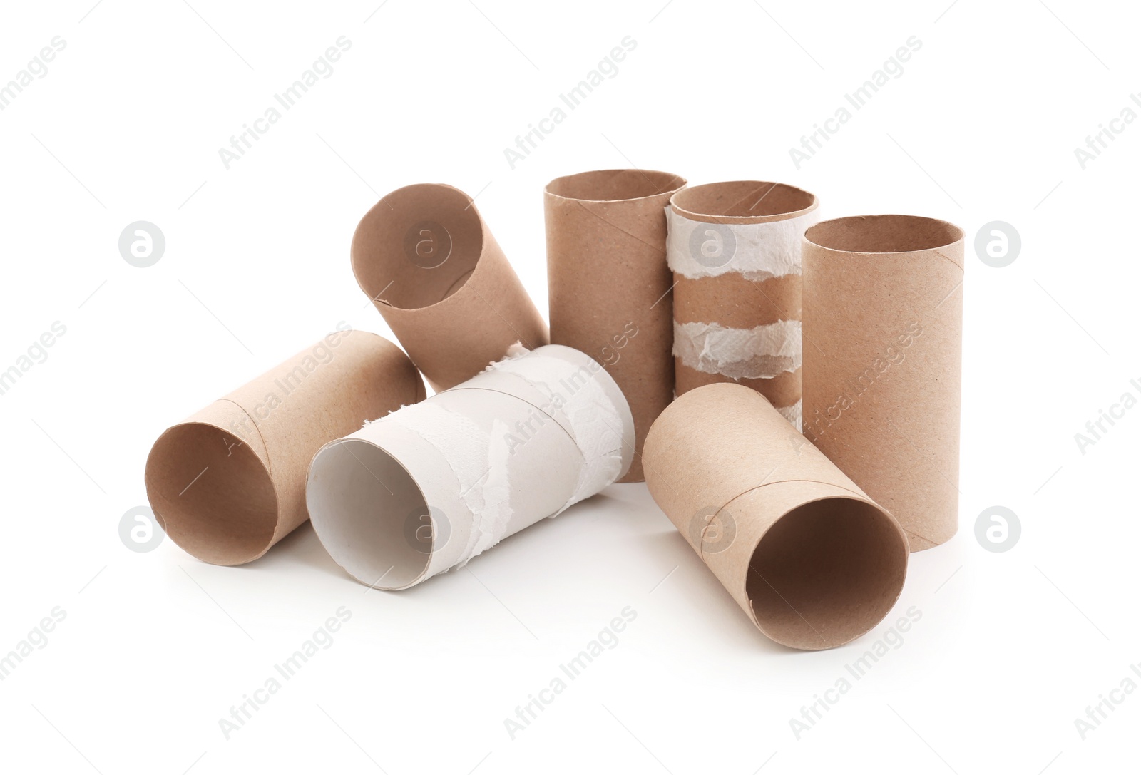 Photo of Empty paper toilet rolls on white background