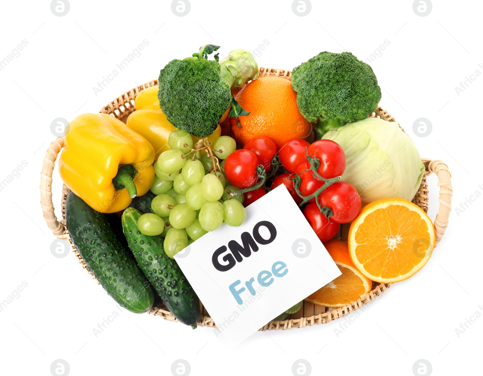 Photo of Tasty fresh GMO free products and paper card on white background, top view