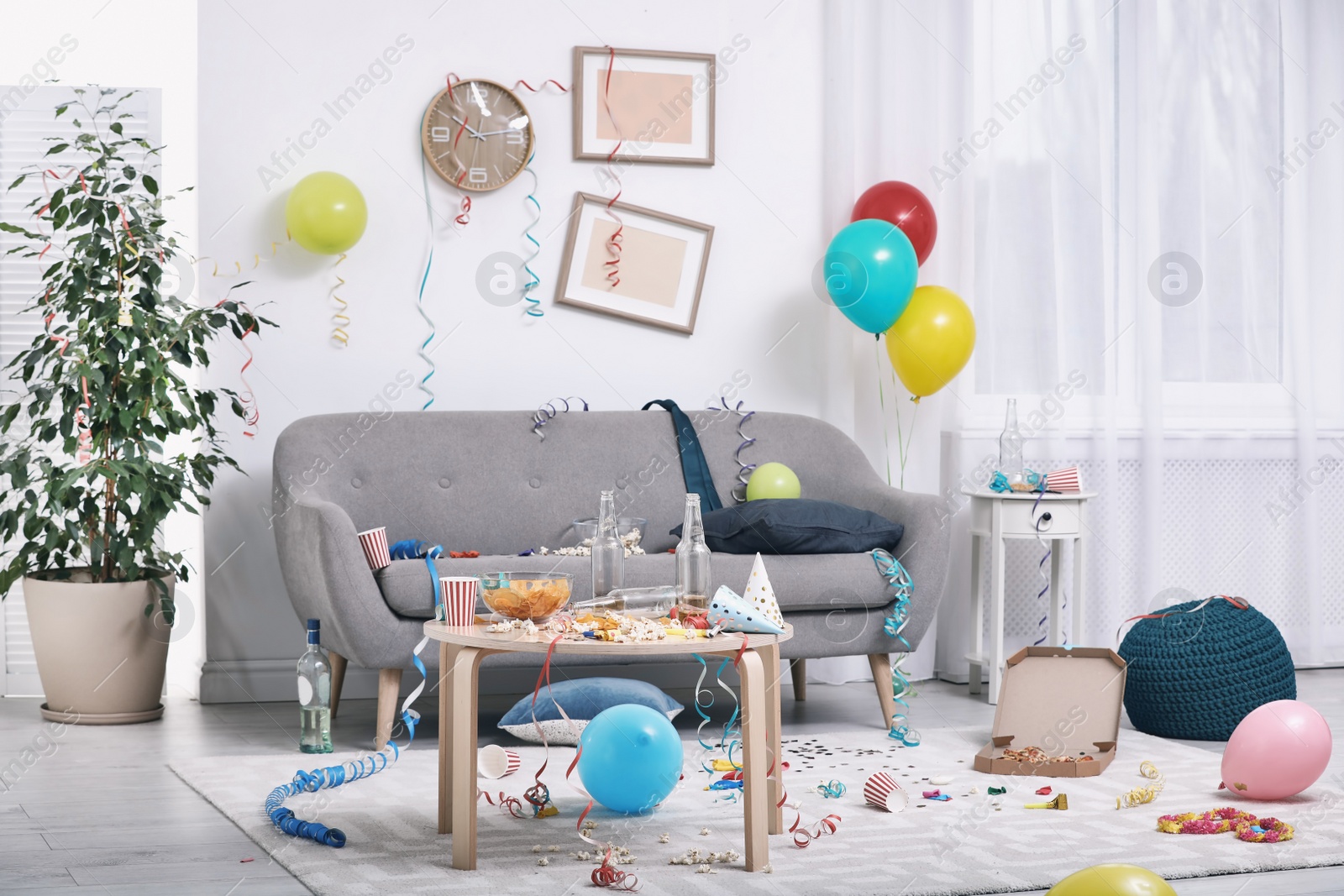 Photo of Messy living room interior. After party chaos