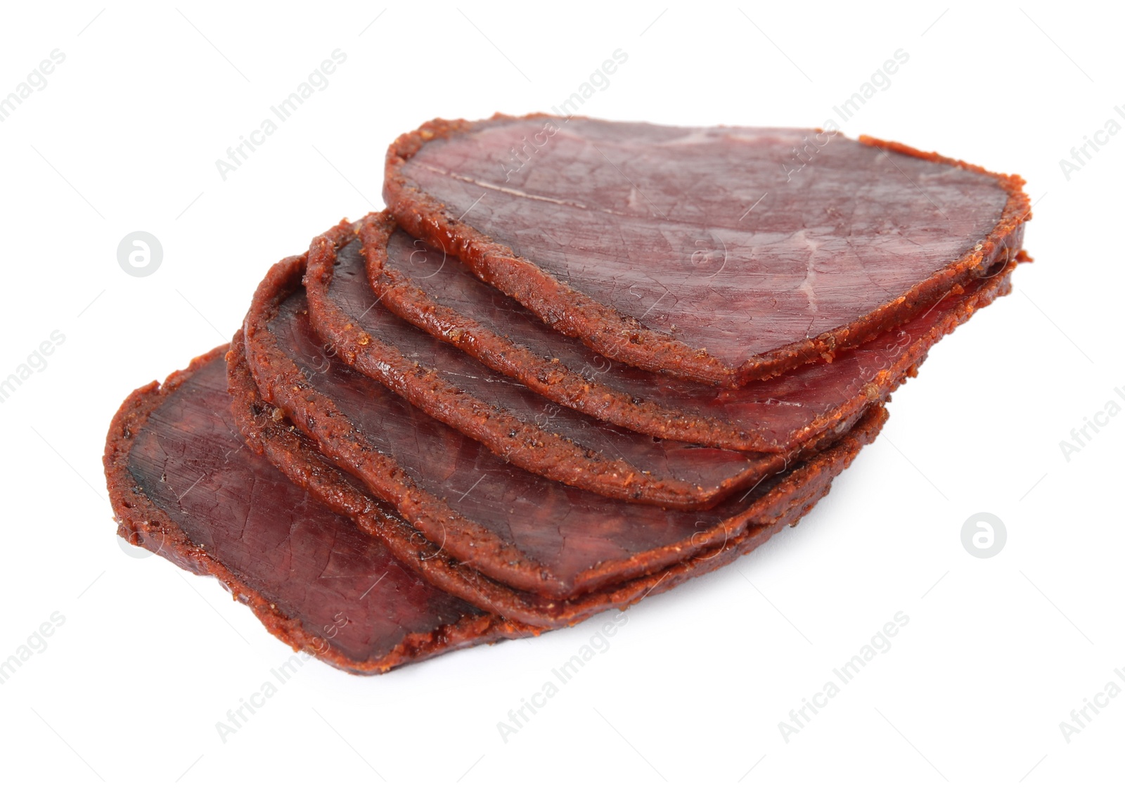 Photo of Delicious dry-cured beef basturma slices on white background