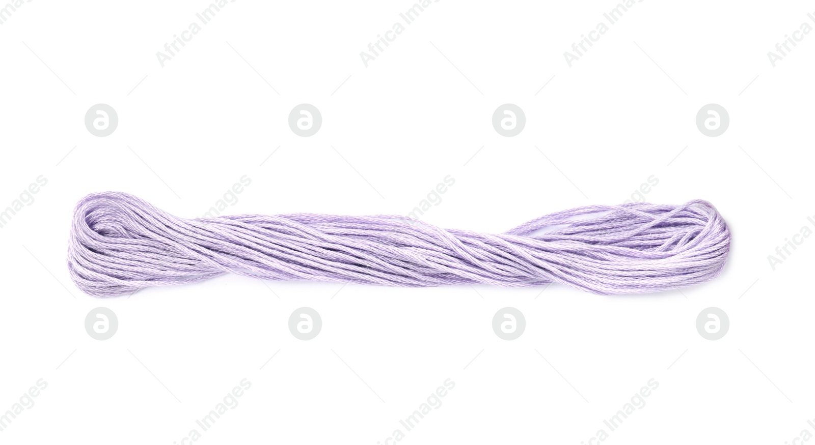 Photo of Pale violet embroidery thread on white background
