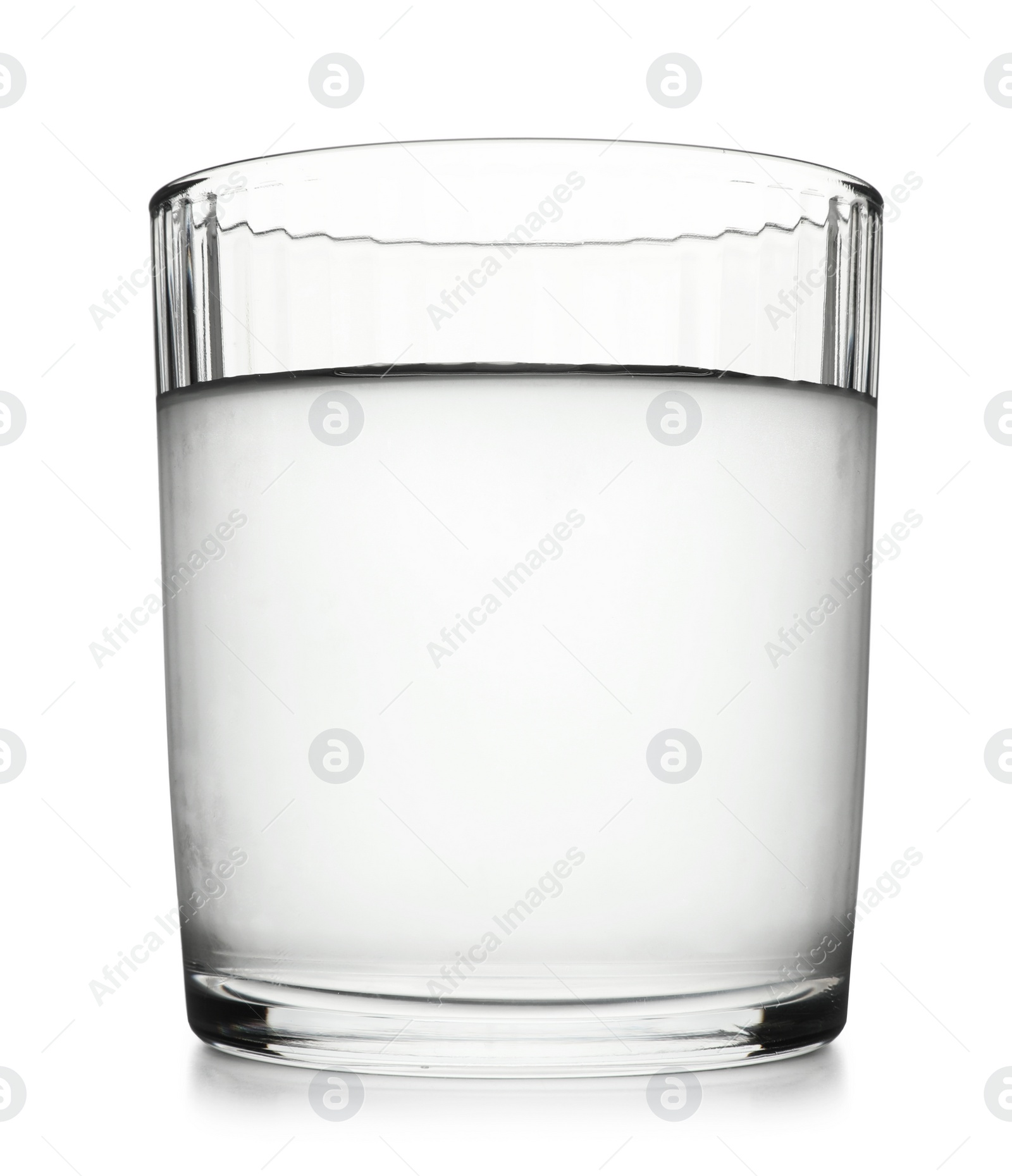 Photo of Glass of cold clear water on white background. Refreshing drink