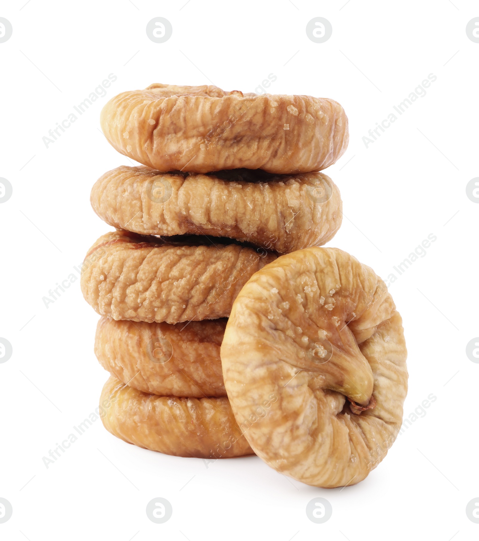 Photo of Stacked tasty dried figs isolated on white