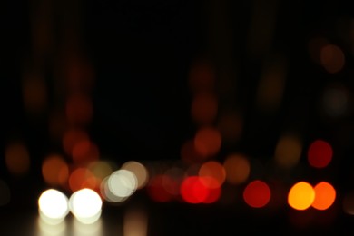 Blurred view of city lights at night. Bokeh effect