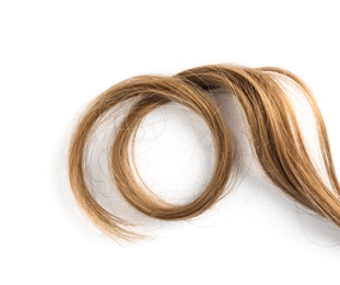 Photo of Strand of beautiful light brown hair on white background, top view. Hairdresser service