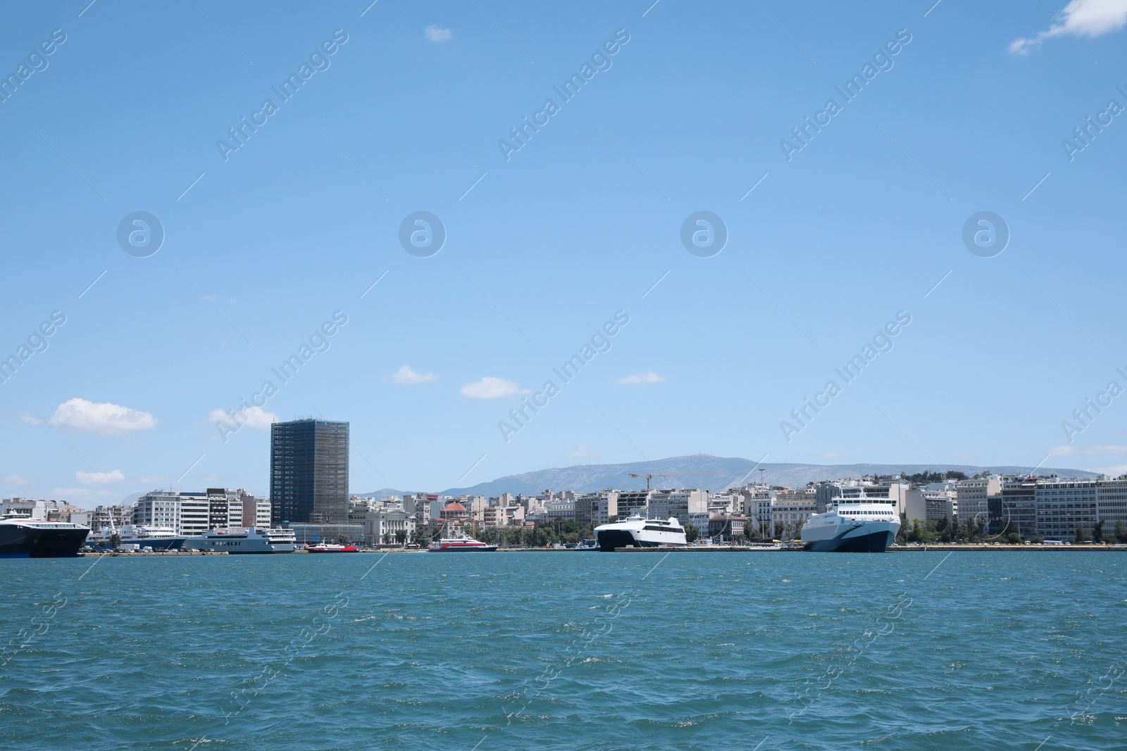 Photo of Picturesque view of port with modern boats on sunny day