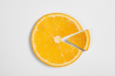 Slices of juicy orange on white background, top view