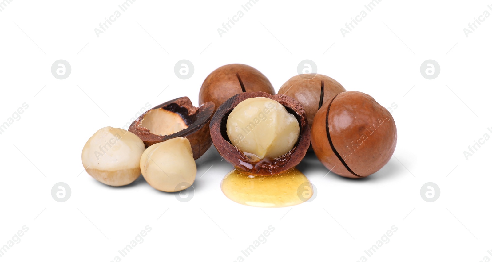 Photo of Delicious organic Macadamia nuts isolated on white