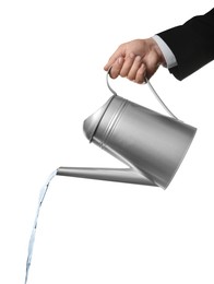 Photo of Businessman pouring water from can on white background, closeup