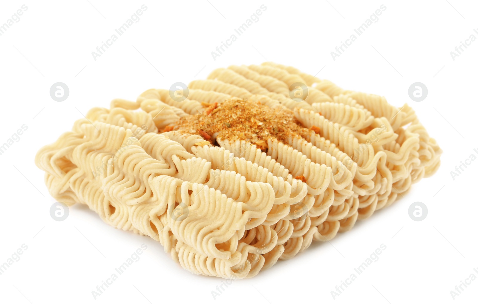 Photo of Block of quick cooking noodles with spices isolated on white