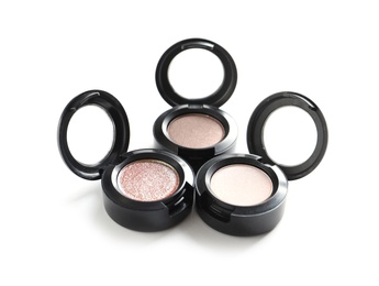 Photo of Different eye shadows on white background. Decorative cosmetics