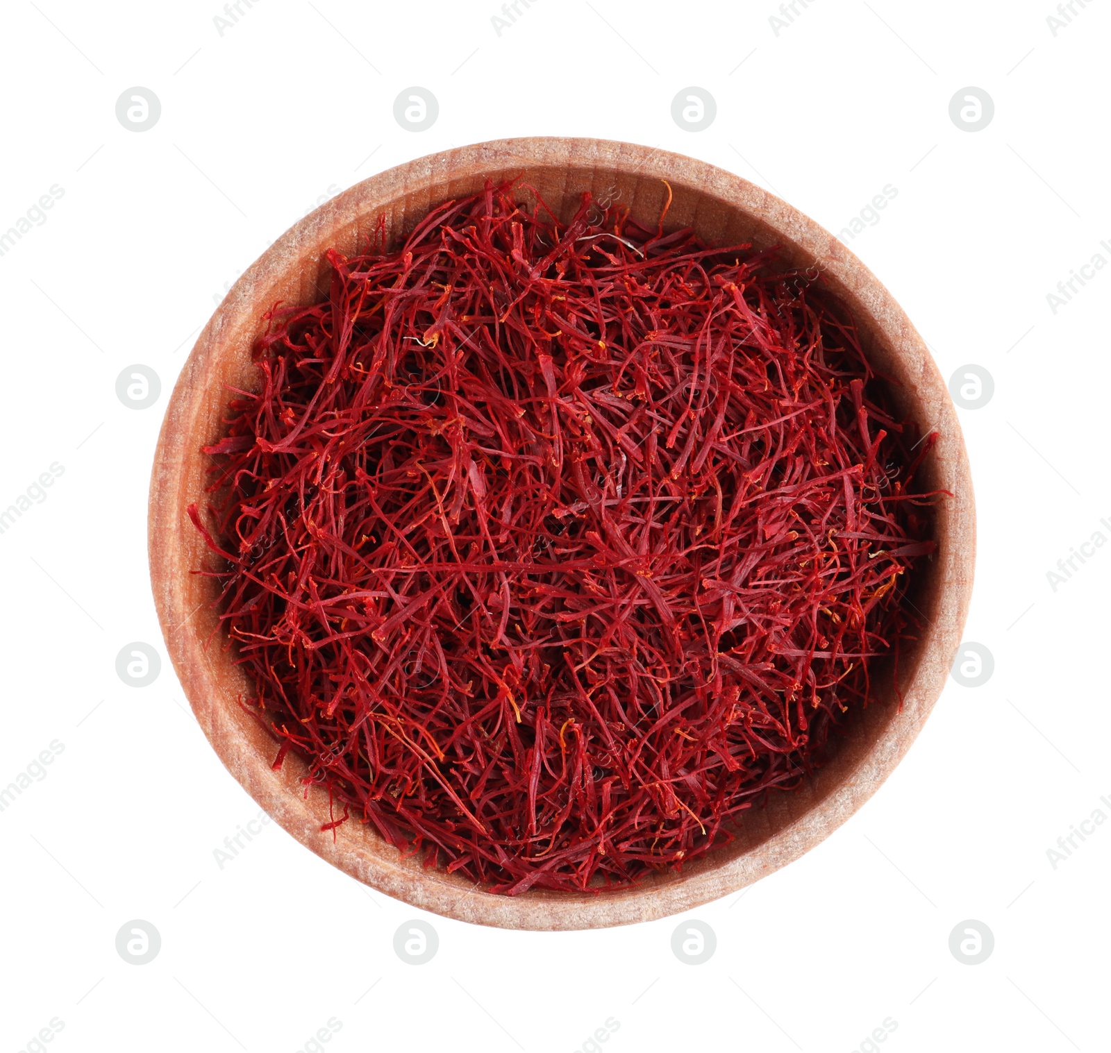 Photo of Dried saffron in wooden bowl isolated on white, top view