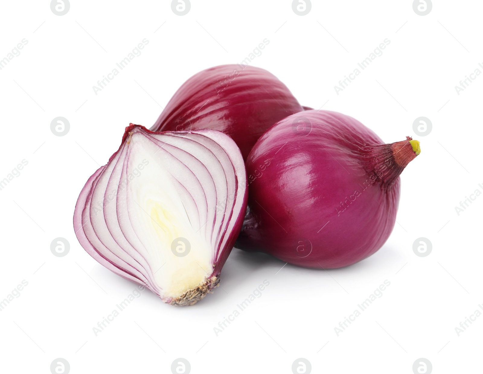 Photo of Fresh cut and whole red onion bulbs isolated on white