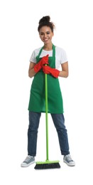 African American woman with green broom on white background