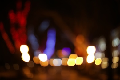 Photo of Beautiful street lights at night. Bokeh effect