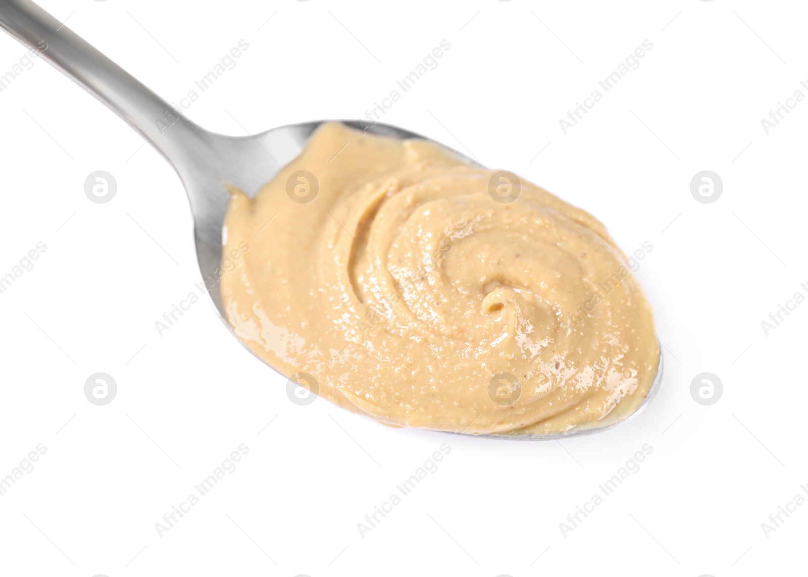 Photo of Delicious nut butter in spoon isolated on white