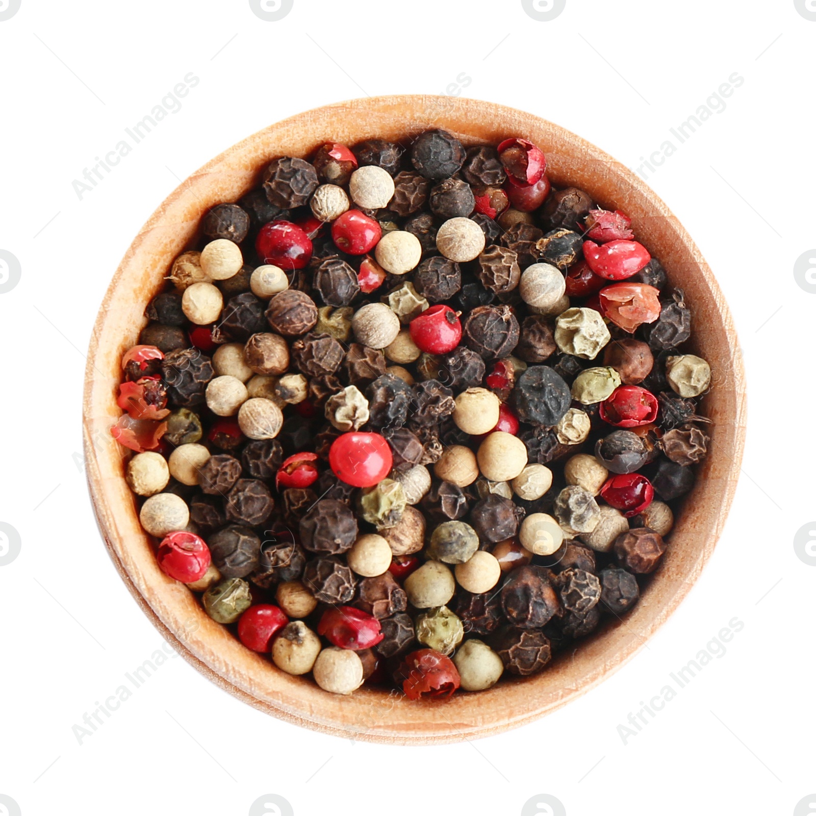 Photo of Bowl of mixed peppercorns isolated on white, top view