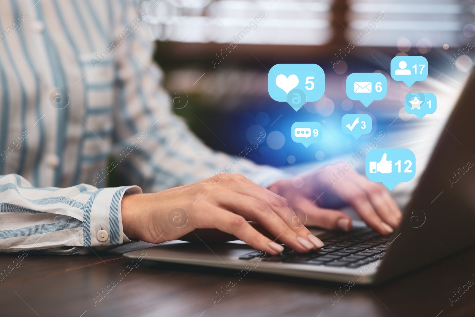 Image of Woman working on modern laptop at table, closeup. Social media marketing