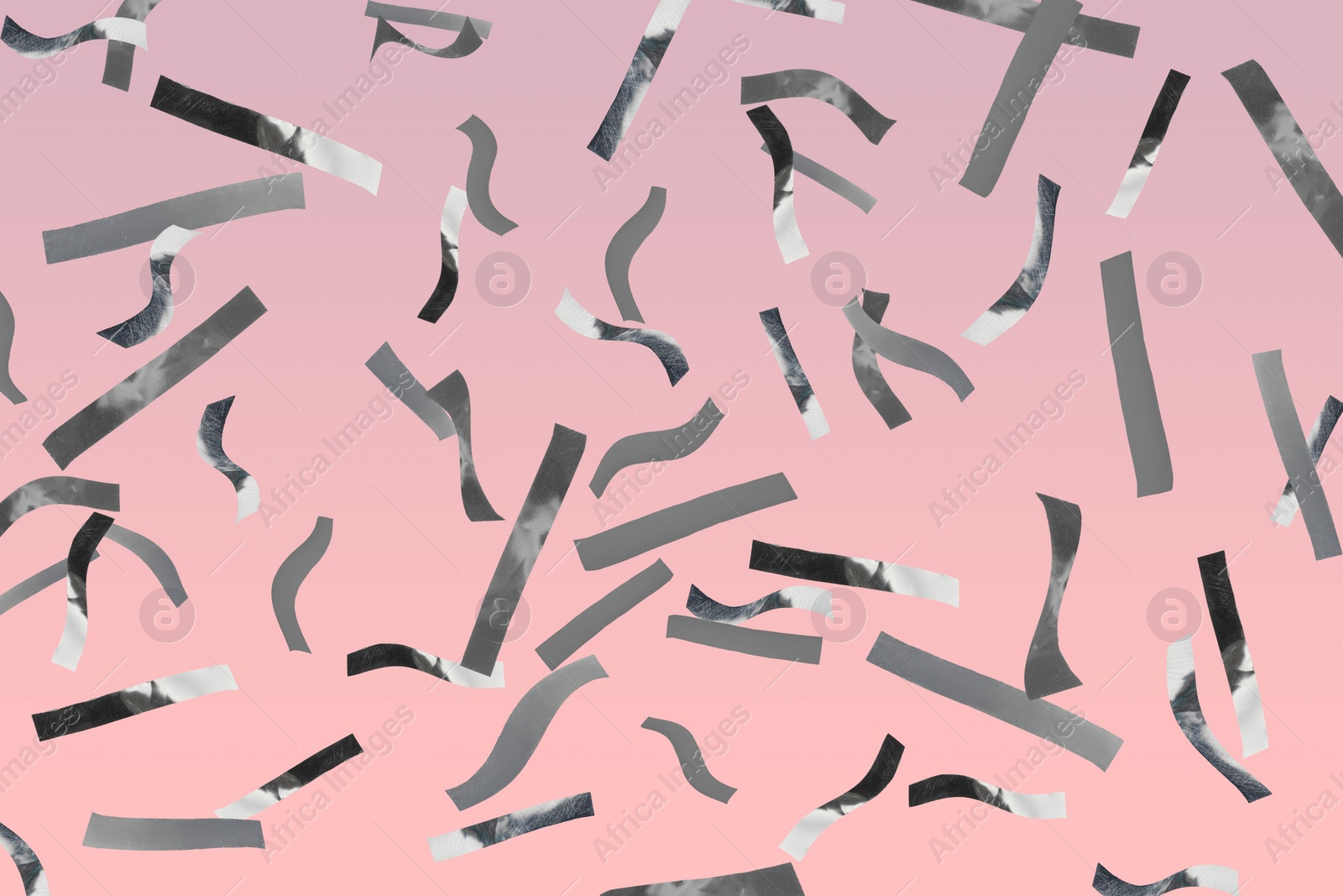 Image of Shiny silver confetti falling on pink background