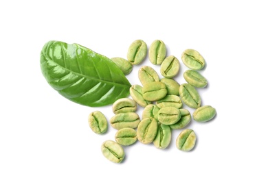 Photo of Green coffee beans and fresh leaf on white background, top view